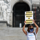 A protester holds a placard in front of the Pennsylvania State Capitol during the Rally for Reproductive Rights in 2021. The rally was organized after the U.S. Supreme Court refused to block a Texas law prohibiting almost all abortions.